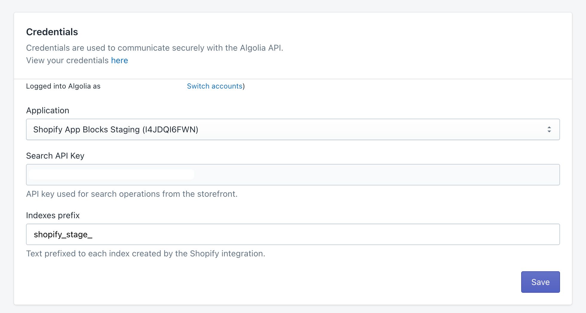 Credentials page in the Algolia AI Search & Discovery app. Paste your Algolia credentials into the fields.